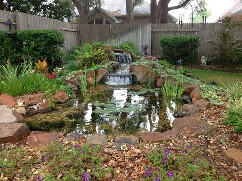 Small 10x12 pond with waterfall in the Austin, TX area starting at $12,000